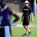 Pioneer head football coach Paul Test walks through morning practice at Pioneer High School on Monday. Melanie Maxwell I AnnArbor.com